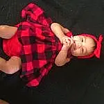Red, Pink, Child, Arm, Pattern, Plaid, Design, Joint, Textile, Leg, Toddler, Baby, Hand, Finger, Tartan, Ear, Person