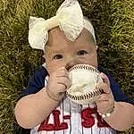 Clothing, Nose, Head, Hand, Eyes, White, Baby & Toddler Clothing, People In Nature, Gesture, Happy, Cap, Glove, Headgear, Grass, Toddler, Plant, Ball, Hat, Baseball Glove, Personal Protective Equipment