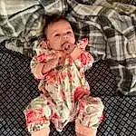 Skin, Head, Arm, Baby & Toddler Clothing, Sleeve, Comfort, Pink, Happy, Baby, Toddler, Pattern, Linens, Thigh, Child, Human Leg, Plaid, Foot, Barefoot, Carmine, Peach, Person