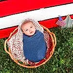 Textile, People In Nature, Happy, Baby & Toddler Clothing, Headgear, Grass, Toddler, Rectangle, Cap, Baby, Fun, Leisure, Pattern, Flag Of The United States, Child, Design, Carmine, Flag, Tree, Font, Person