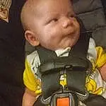Face, Skin, Photograph, Eyes, Seat Belt, Comfort, Finger, Baby & Toddler Clothing, Baby, Sleeve, Toddler, Thumb, Auto Part, Thigh, Baby Products, Car Seat, Child, Happy, Sitting, Person
