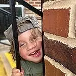 Face, Hand, Photograph, Smile, Wood, Hat, Happy, Cap, Brick, Toddler, Brickwork, Sun Hat, Fun, Leisure, Child, Soil, Carmine, Cake, Icing, Person, Joy, Headwear