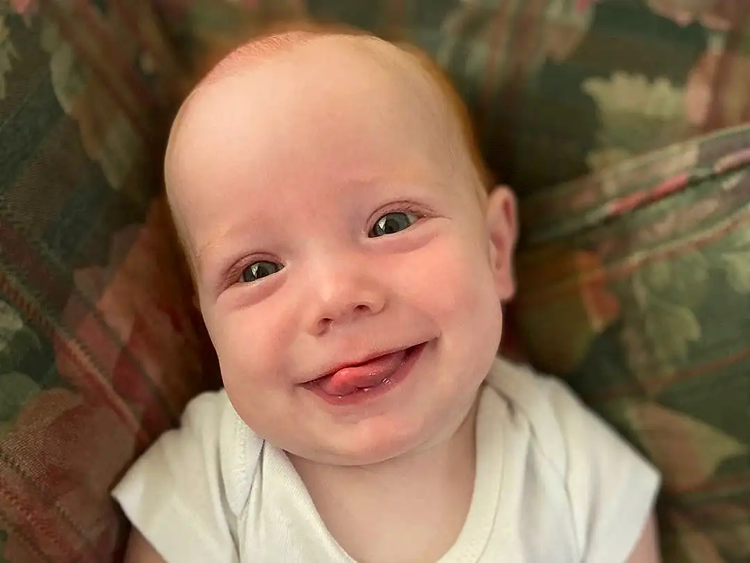 Nose, Cheek, Smile, Skin, Head, Lip, Eyebrow, Arm, Eyes, Mouth, Human Body, Sleeve, Baby & Toddler Clothing, Baby, Iris, Happy, Plant, Toddler, Cool, Flash Photography, Person, Joy