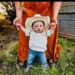 Clothing, Jeans, Plant, Leg, People In Nature, Dress, Flash Photography, Hat, Happy, Sunlight, Grass, Tree, Headgear, Sun Hat, Leisure, Toddler, Baby, Grassland, Fun, Person