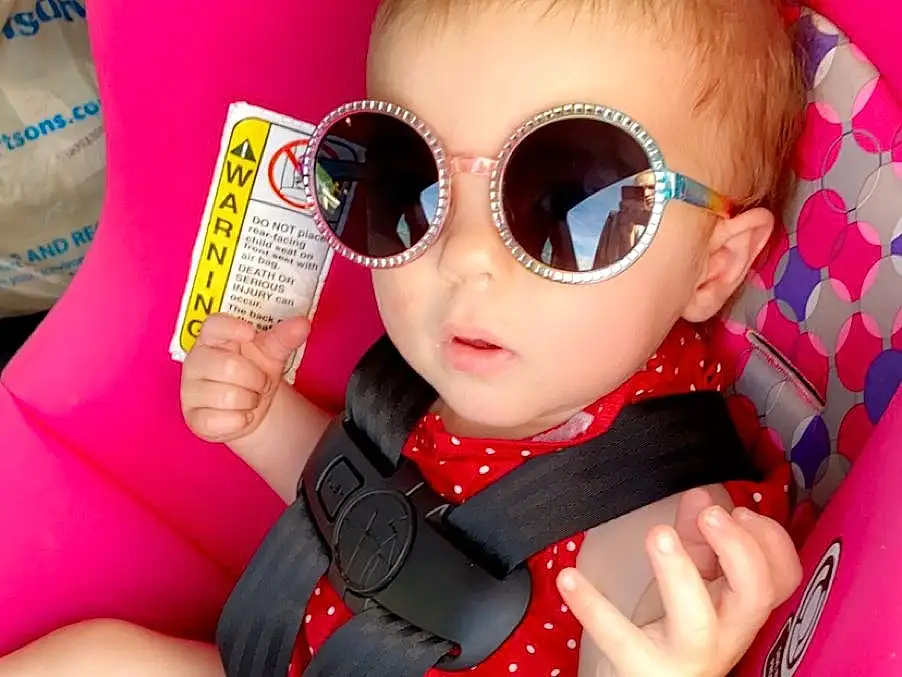 Eyewear, Pink, Sunglasses, Glasses, Cool, Car Seat, Child, Design, Toy, Plaid, Vision Care, Personal Protective Equipment, Magenta, Pattern, Doll, Thigh, Toddler, Person