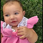 Nose, Cheek, Skin, Lip, Hand, Arm, Smile, Baby & Toddler Clothing, Happy, Pink, Gesture, Dress, Baby, Finger, Thumb, People In Nature, Grass, Toddler, Beauty, Leisure, Person, Joy