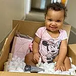 Cheek, Skin, Smile, Sleeve, Baby & Toddler Clothing, Shipping Box, Pink, Happy, Toddler, Comfort, Baby, T-shirt, Child, Sitting, Fun, Box, Packing Materials, Room, Carton, Person, Joy