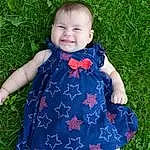 Clothing, Face, Smile, Photograph, Dress, People In Nature, Plant, Leaf, Baby & Toddler Clothing, Human Body, Purple, Sleeve, Grass, Finger, Toddler, One-piece Garment, Electric Blue, Pattern, Child, Person, Joy