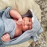 Face, Head, Skin, Hand, Arm, Comfort, Human Body, Gesture, Finger, Baby, Baby Sleeping, Toddler, Linens, Child, Thumb, Hat, Foot, Furry friends, Grass, Nap, Person, Headwear