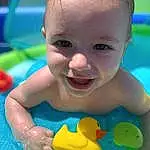 Child, Baby Playing With Toys, Toddler, Baby, Skin, Play, Fun, Toy, Tummy Time, Baby Bathing, Baby Products, Leisure, Smile, Bath Toy, Recreation, Baby Float, Swimming Pool, Baby Toys, Person