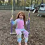 Leaf, Nature, People In Nature, Tree, Plant, Grass, Swing, Public Space, Happy, Woody Plant, Toddler, Playground, Recreation, Leisure, Fun, Outdoor Play Equipment, City, Child, T-shirt, Soil, Person, Surprise
