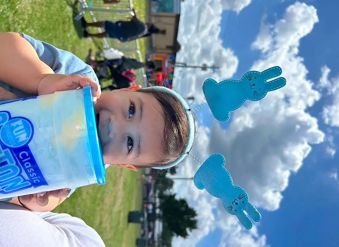 Water, Cloud, Sky, Blue, Green, Happy, Leisure, Recreation, Electric Blue, Toddler, Drinking Water, Fun, Drinking, T-shirt, Cumulus, Child, Hat, Plastic Bottle, Grass, Personal Protective Equipment, Person