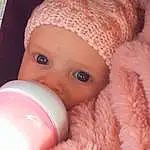 Nose, Cheek, Skin, Lip, Eyes, Cap, Baby, Baby & Toddler Clothing, Iris, Pink, Headgear, Comfort, Toddler, Eyelash, Baby Sleeping, Bottle, Knit Cap, Child, Helmet, Drinkware