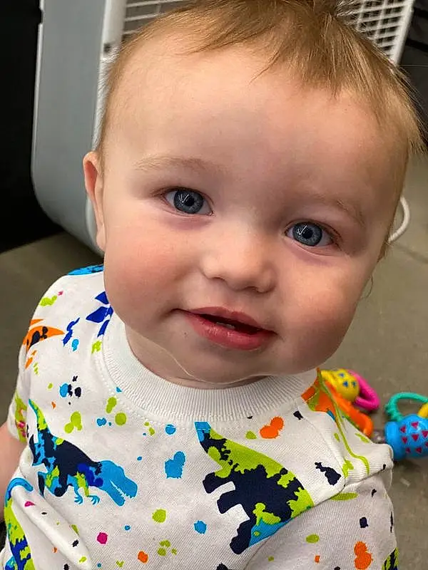 Forehead, Nose, Face, Cheek, Skin, Head, Lip, Chin, Hairstyle, Eyebrow, Eyes, Facial Expression, Eyelash, Mouth, Blue, Baby & Toddler Clothing, Iris, Neck, Baby, Person