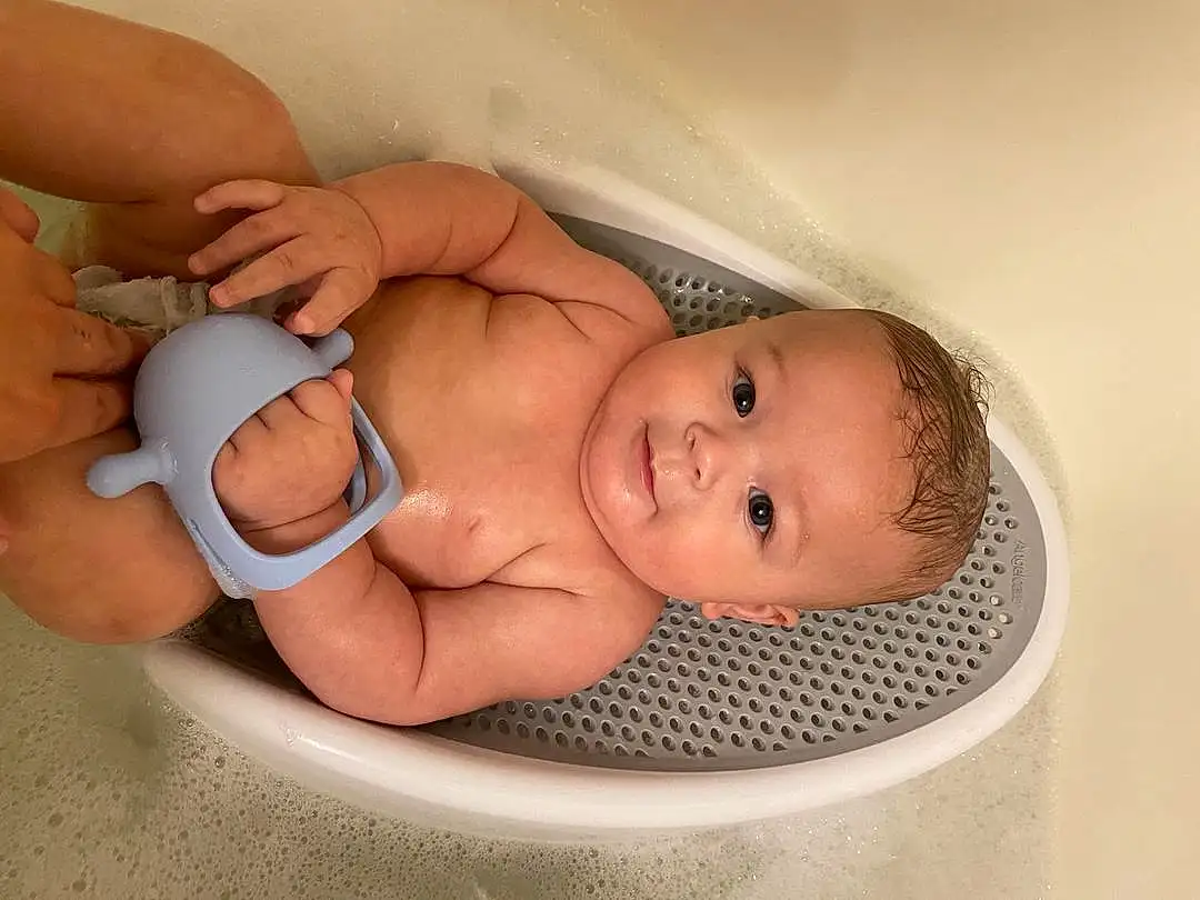 Skin, Hand, Arm, Human Body, Baby, Fluid, Comfort, Stomach, Finger, Toddler, Chest, Bathing, Child, Thumb, Room, Abdomen, Baby Products, Baby Sleeping, Service, Flesh, Person