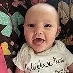 Face, Forehead, Nose, Hair, Smile, Cheek, Skin, Head, Lip, Chin, Eyebrow, Eyes, Mouth, Textile, Iris, Baby & Toddler Clothing, Happy, Sleeve, Baby, Ear, Person