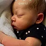Face, Nose, Cheek, Skin, Head, Lip, Chin, Arm, Eyes, Eyelash, Comfort, Baby & Toddler Clothing, Ear, Neck, Sleeve, Baby, Iris, Toddler, Happy, Baby Sleeping, Person