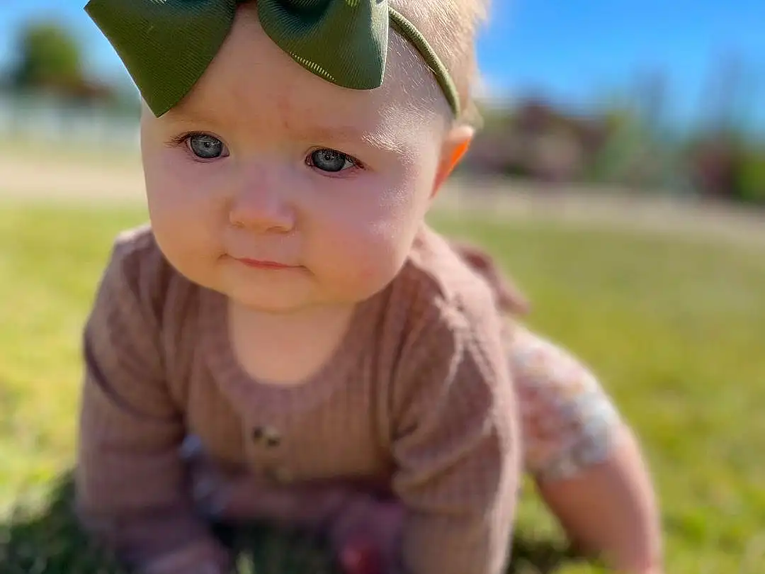 Clothing, Glasses, Skin, Head, Eyes, Plant, Cap, Leaf, People In Nature, Human Body, Baby & Toddler Clothing, Grass, Happy, Headgear, Baby, Toddler, Hat, Grassland, Person, Headwear