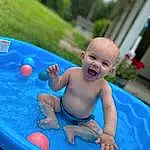 Water, Azure, Smile, Fun, Leisure, Aqua, Summer, Grass, Toddler, Baby, Recreation, Child, Happy, Baby Bathing, Plant, Bathing, Inflatable, Play, Event, Person