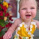 Smile, Skin, Head, Hairstyle, Eyes, Facial Expression, Lei, Baby & Toddler Clothing, Happy, Iris, Orange, Yellow, Pink, Child, Summer, Toddler, Beauty, Baby, Fun, Event, Person
