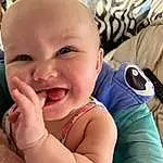 Nose, Face, Cheek, Smile, Skin, Head, Lip, Chin, Mouth, Eyes, Facial Expression, Happy, Gesture, Iris, Baby, Finger, Baby & Toddler Clothing, Cool, Headgear, Toddler, Person