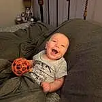 Smile, Mouth, Textile, Comfort, Baby & Toddler Clothing, Wood, Baby, Toddler, T-shirt, Room, Child, Fun, Sitting, Toy, Linens, Person