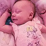 Nose, Cheek, Skin, Lip, Photograph, Facial Expression, Mouth, Comfort, Baby & Toddler Clothing, Baby, Pink, Baby Sleeping, Finger, Happy, Toddler, Linens, Child, Bedtime, Peach, Magenta, Person