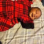 Tartan, Textile, Sleeve, Baby & Toddler Clothing, Orange, Comfort, Plaid, Red, Toddler, Baby, Pattern, Tints And Shades, Linens, Design, Child, Carmine, Baby Products, Room, Portrait Photography, Person