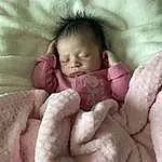 Nose, Cheek, Skin, Lip, Hand, Eyebrow, Facial Expression, Comfort, Mouth, Baby Sleeping, Textile, Baby, Gesture, Pink, Finger, Toddler, Baby & Toddler Clothing, Linens, Thumb, Child, Person
