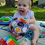 White, Green, Light, World, Happy, Smile, Yellow, Fun, Red, Leisure, Summer, Toddler, Toy, People, Child, Plant, Baby & Toddler Clothing, Recreation, Grass, Party Supply, Person