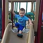 Standing, Playground, Sky, Fun, Toddler, T-shirt, Leisure, Smile, Baby & Toddler Clothing, Recreation, Summer, Outdoor Play Equipment, City, Shorts, Electric Blue, Child, Playground Slide, Chute, Happy, Play, Person, Joy