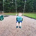 Plant, Swing, Tree, Grass, Playground, Baby, Toddler, Leisure, Woody Plant, Public Space, Fun, Outdoor Play Equipment, Electric Blue, Ball, City, Recreation, People In Nature, Play, Baby & Toddler Clothing, Soil, Person