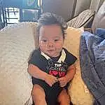 Skin, Hairstyle, Mouth, Comfort, Leg, Flash Photography, Textile, Happy, Couch, Iris, Dress, Interaction, Finger, Thigh, Cool, Baby & Toddler Clothing, Toddler, Baby, Person