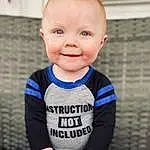 Face, Hair, Cheek, Skin, Joint, Smile, Chin, Eyes, Baby & Toddler Clothing, Human Body, Sleeve, Baby, Happy, Iris, Finger, Knee, Thigh, T-shirt, Toddler, Electric Blue, Person, Joy