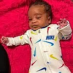 Face, Cheek, Skin, Hand, Outerwear, White, Baby & Toddler Clothing, Sleeve, Happy, Gesture, Finger, Jheri Curl, Toddler, Red, Baby, Child, Thumb, Fun, Sitting, Person