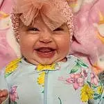 Cheek, Smile, Skin, Facial Expression, Textile, Sleeve, Happy, Dress, Baby & Toddler Clothing, Pink, Headgear, Toddler, Child, Fun, Event, Baby, Baby Products, Headpiece, Fashion Accessory, Peach, Person, Headwear
