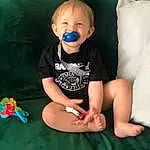 Flash Photography, Gesture, Headgear, Toy, Hat, Child, Knee, Happy, Thigh, Baby & Toddler Clothing, T-shirt, Blond, Fun, Toddler, Human Leg, Electric Blue, Wrist, Chalk, Sitting, Jewellery, Person
