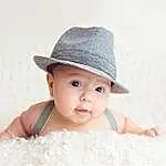Face, Cap, Flash Photography, Baby & Toddler Clothing, Baby, Happy, Headgear, Toddler, Sun Hat, Hat, Fashion Accessory, Pattern, Fun, Costume Hat, Smile, Hair Accessory, Portrait Photography, Linens, Black & White, Person, Headwear