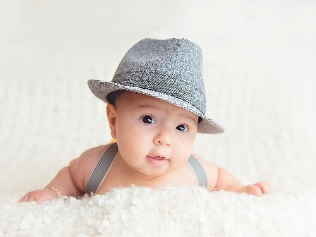 Face, Cap, Flash Photography, Baby & Toddler Clothing, Baby, Happy, Headgear, Toddler, Sun Hat, Hat, Fashion Accessory, Pattern, Fun, Costume Hat, Smile, Hair Accessory, Portrait Photography, Linens, Black & White, Person, Headwear