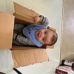 Smile, Wood, Shipping Box, Package Delivery, Comfort, Packing Materials, Toddler, Carton, Baby, Packaging And Labeling, Cardboard, Box, Child, Automotive Design, Vehicle Door, Hardwood, Room, Paper Product, Person