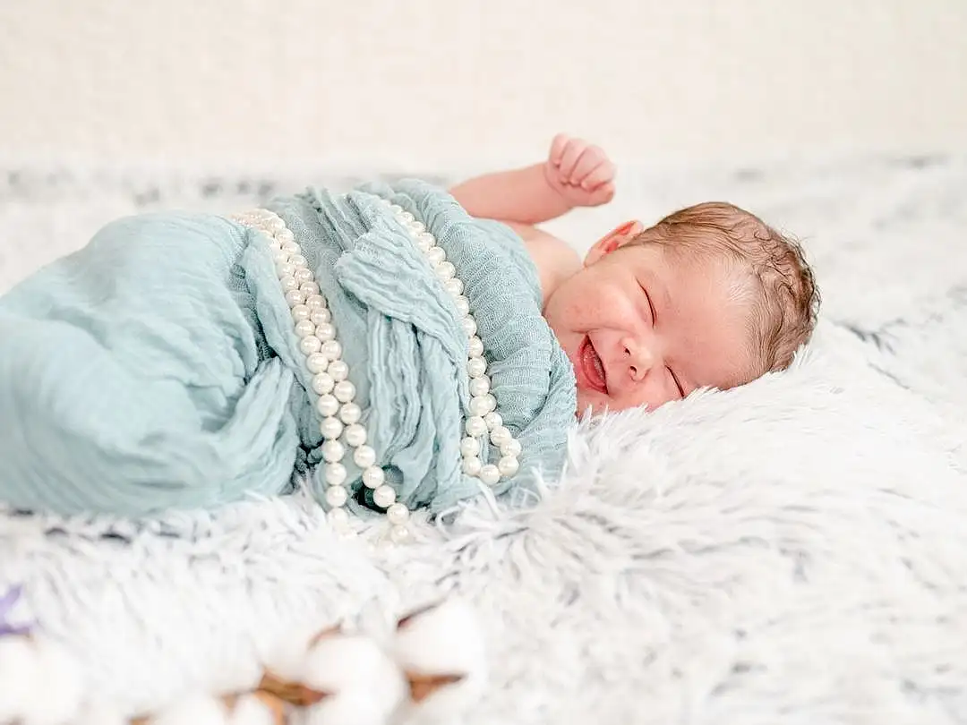 Face, Skin, Eyes, Comfort, Textile, Baby Sleeping, Sleeve, Baby & Toddler Clothing, Baby, Toddler, Linens, Child, Bedding, Furry friends, Bedtime, Bed, Pattern, Portrait Photography, Nap, Person