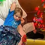 Happy, Leisure, Toddler, Fun, Event, Recreation, Entertainment, Pattern, Holiday, Tree, Tradition, Child, Sitting, Room, T-shirt, Christmas, Play, Party, Ornament, Visual Arts, Person