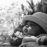 Skin, Lip, Plant, Hat, People In Nature, Leaf, Black, Black-and-white, Flash Photography, Happy, Style, Cap, Sun Hat, Baby, Grass, Headgear, Monochrome, Morning, Black & White, Person, Headwear