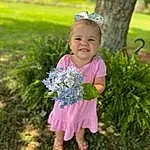 Plant, Smile, People In Nature, Flower, Nature, Leaf, Baby & Toddler Clothing, Botany, Happy, Tree, Grass, Toddler, Baby, Terrestrial Plant, Summer, Meadow, Child, Magenta, Garden, Person, Joy