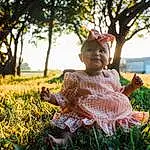 Plant, Tree, Dress, People In Nature, Happy, Sunlight, Headgear, Grass, Fawn, Grassland, Morning, Baby, Wood, Hat, Landscape, Meadow, Sky, Baby & Toddler Clothing, Lawn, Person