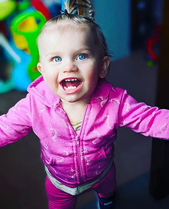 Face, Cheek, Skin, Head, Lip, Chin, Smile, Eyes, Mouth, Purple, Human Body, Flash Photography, Baby & Toddler Clothing, Sleeve, Happy, Iris, Gesture, Pink, Cool, Toddler, Person