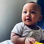 Child, Face, Toddler, Skin, Baby, Cheek, Yellow, Nose, Head, Sitting, Eyes, Play, Smile, Tummy Time, Baby Playing With Toys, Lip, Fun, Mouth, Photography, Happy, Person