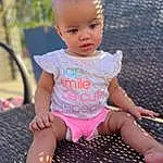 Joint, Skin, Leg, Baby & Toddler Clothing, Sleeve, Pink, Finger, Happy, Grass, Thigh, Toddler, Child, T-shirt, Leisure, Fun, Beauty, Human Leg, Foot, Baby, Sitting, Person