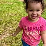 Jeans, Smile, Hairstyle, Shoulder, Plant, People In Nature, Sleeve, Happy, Grass, Baby & Toddler Clothing, Toddler, Waist, T-shirt, Fun, Tree, Magenta, Leisure, Child, Grassland, Soil, Person, Joy