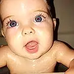 Child, Face, Cheek, Skin, Nose, Baby Bathing, Facial Expression, Baby, Forehead, Eyebrow, Chin, Head, Lip, Bathing, Eyes, Toddler, Close-up, Mouth, Muscle, Iris, Person